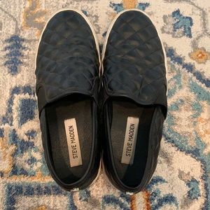 Steve Madden slip ons.